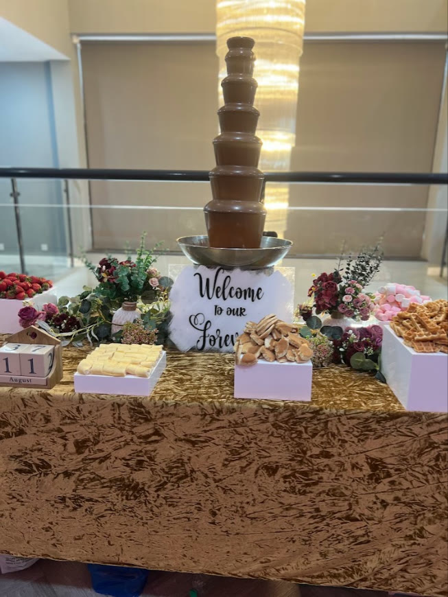 Chocolate fountain & dessert table at an event booked by Samiya A.